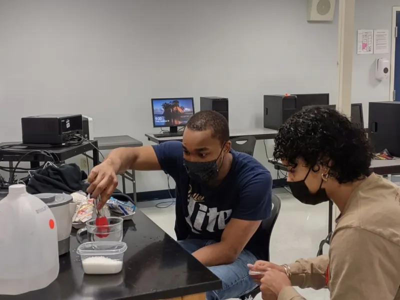 Two North River School students working on a hands-on science activity