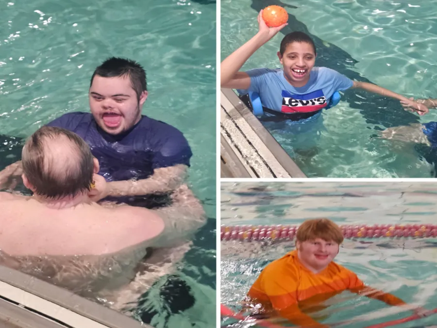 Students smiling and playing during an adaptive swim program